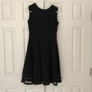 A line black tuxedo fabric dress from Calvin Klein